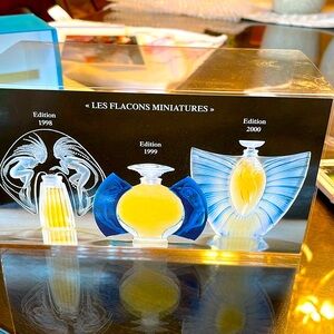Three Lalique miniature perfumes, Les Flacons Miniatures set, unopened.